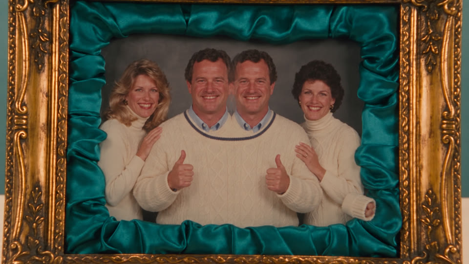 An uncanny family portrait with a duplicated father fused to another family member